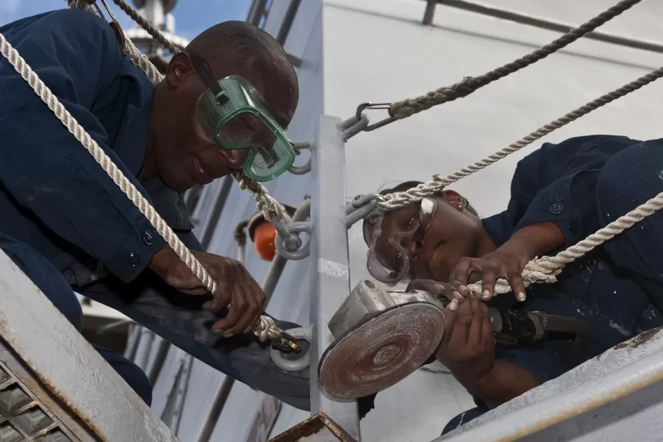 USS Arleigh Burke Sailors perform preservation maintenance